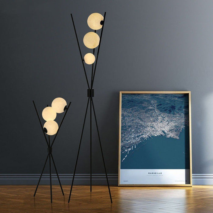 Sleek minimalist LED floor lamp in a modern living room.
