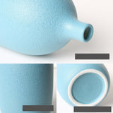 Blue handmade ceramic vase for interior decoration