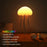 Mushroom-shaped night light on a bedside table with text describing its features.