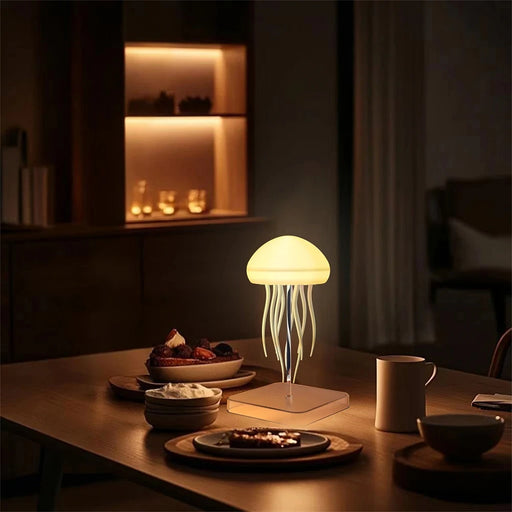 Jellyfish-shaped lamp on a table with food in a dimly lit room
