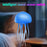 Blue jellyfish-shaped intelligent sound sensor switch with text on a blurred background